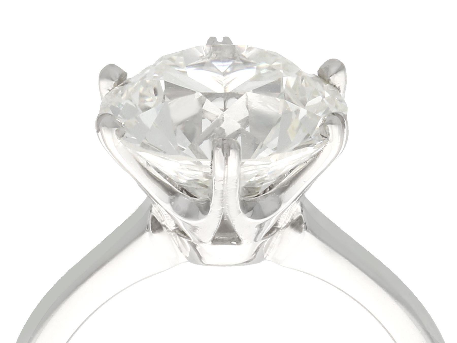 An exceptional and impressive antique 4.89 carat diamond solitaire ring, displayed in a contemporary platinum setting; part of our diverse diamond jewelry collections.

An exceptional and impressive antique 4.89 carat diamond solitaire ring is