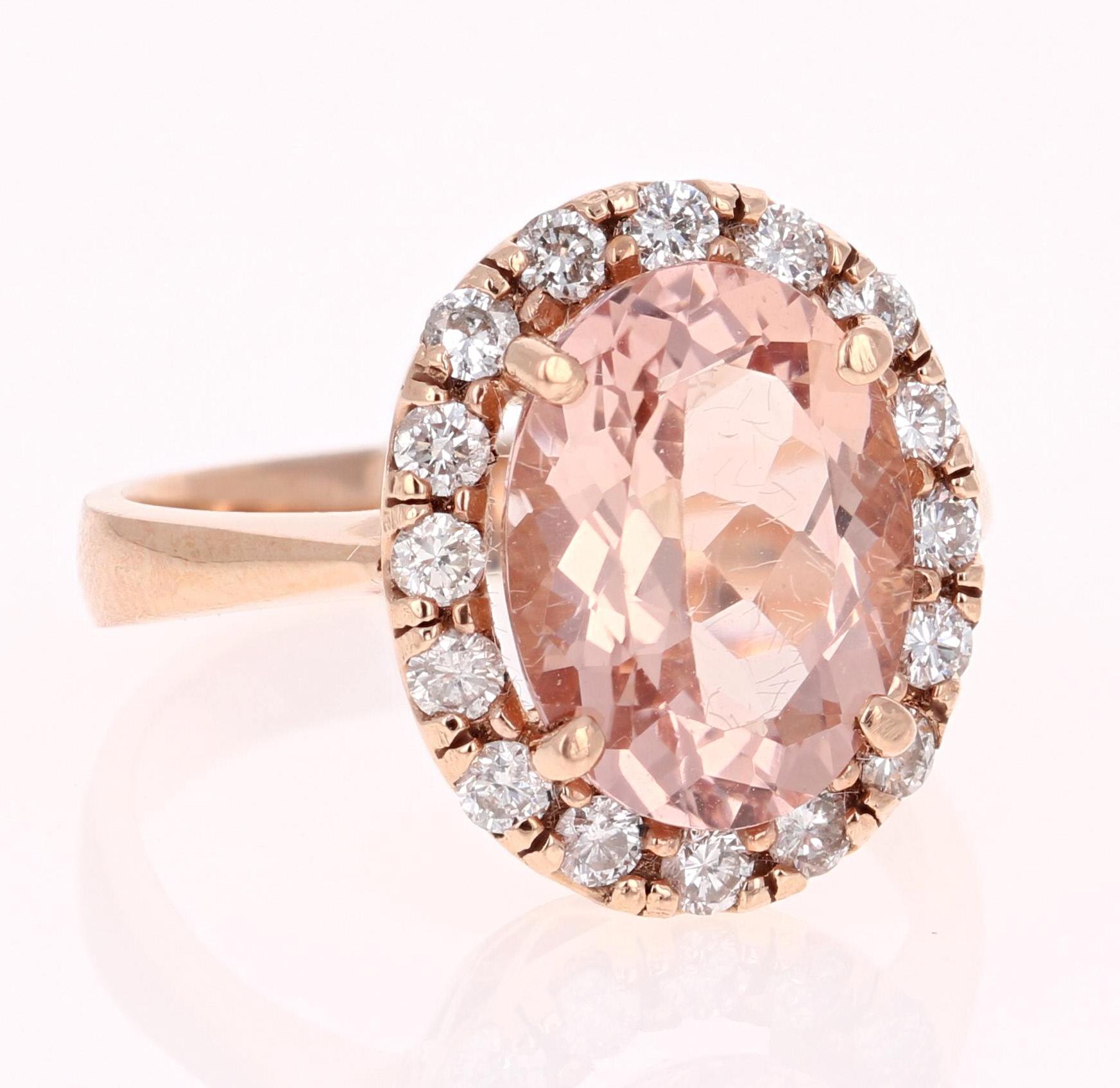 This classic Morganite Ring has an Oval Cut 4.20 Carat Morganite as its center and is surrounded by 16 Round Cut Diamonds that weigh 0.69 Carats. The clarity and color of the diamonds are SI2-F. The total carat weight of the ring is 4.89 Carats.
It