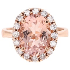 Anello in oro rosa con diamante aureolato con Morganite naturale da 4,89 carati