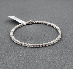 Bracelet « tennis » en diamants de 4,89 carats, monté sur platine