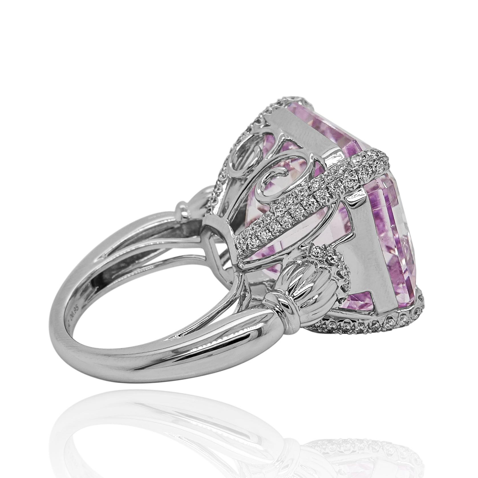 1 Kunzite Gemstone: 47.97 Carats
116 White Diamonds: 0.95 Carats
Metal: 18K White Gold, 17.30 Grams