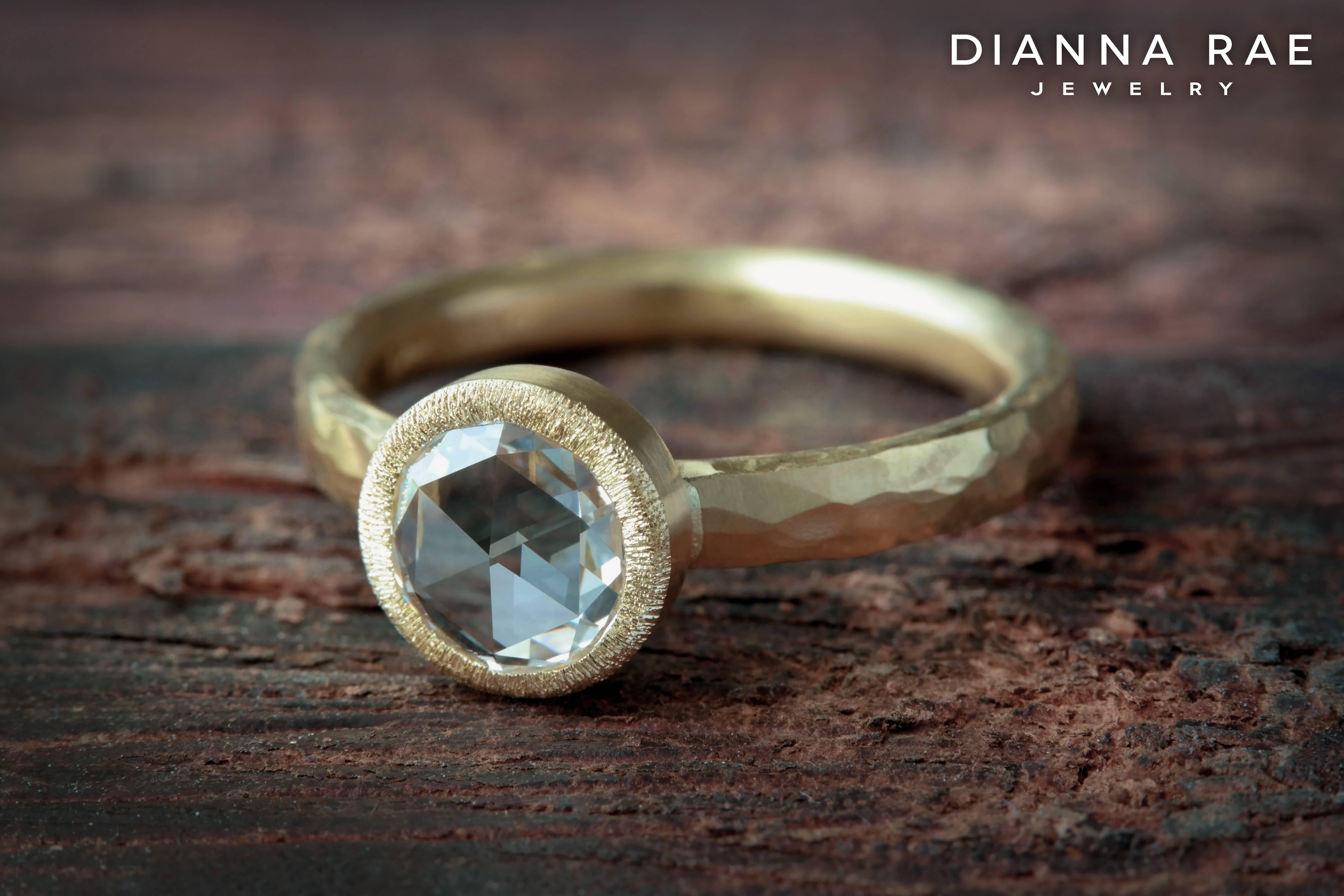 .48ct Bezel Set Rose Cut Diamond Ring with Matte 18K Yellow Gold Hammered Band

This ring was handmade in 18K Yellow Gold.  The .48ct Round Rose Cut diamond is bezel set, VS-1 in clarity and H in color.  My goldsmith added all of the textures by