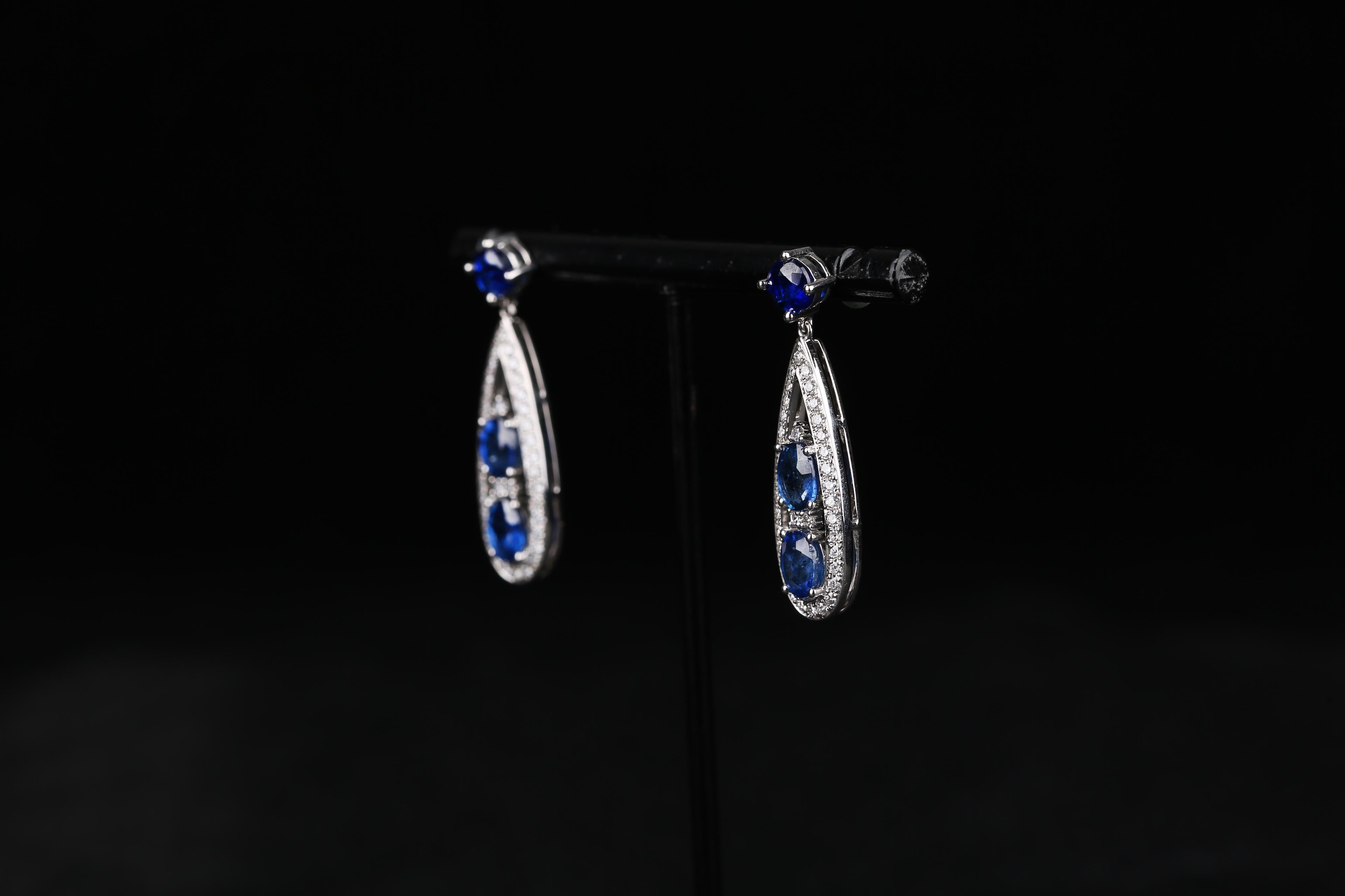 Oval Cut Eostre Blue Sapphire and Diamond Earring in 18K White Gold For Sale