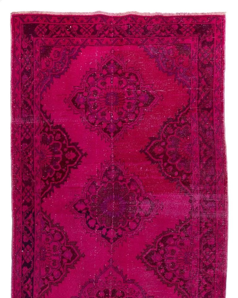 A vintage Turkish runner rug re-dyed in fuchsia pink color for contemporary interiors.
Finely hand knotted, low wool pile on cotton foundation. Professionally washed.
Sturdy and can be used on a high traffic area, suitable for both residential and