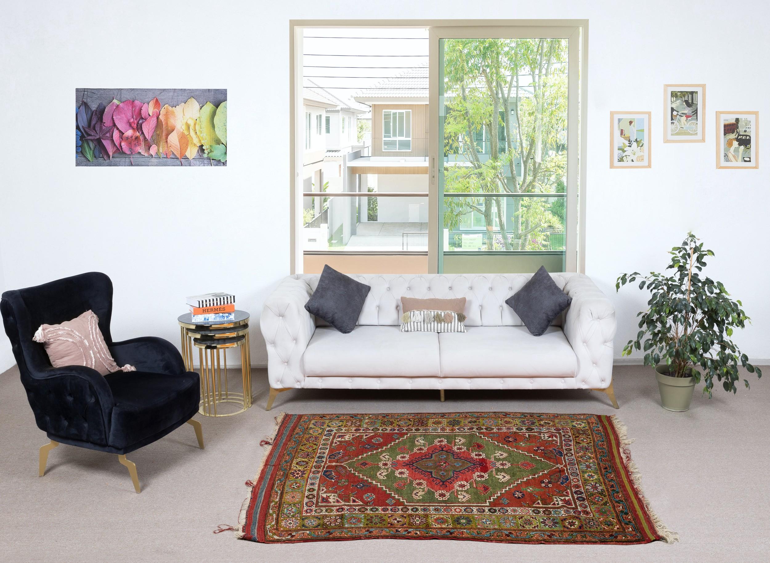 Add a touch of timeless elegance to your home with this antique hand knotted Turkish rug, crafted from 100% premium wool. This exquisite piece captures the essence of traditional Anatolian craftsmanship, featuring intricate patterns and a harmonious