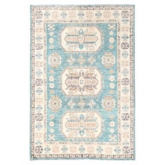 Tappeto in lana annodato a mano "Cloudbank Kazak" blu verde acqua, 142 x 208 cm, con annodi turchi