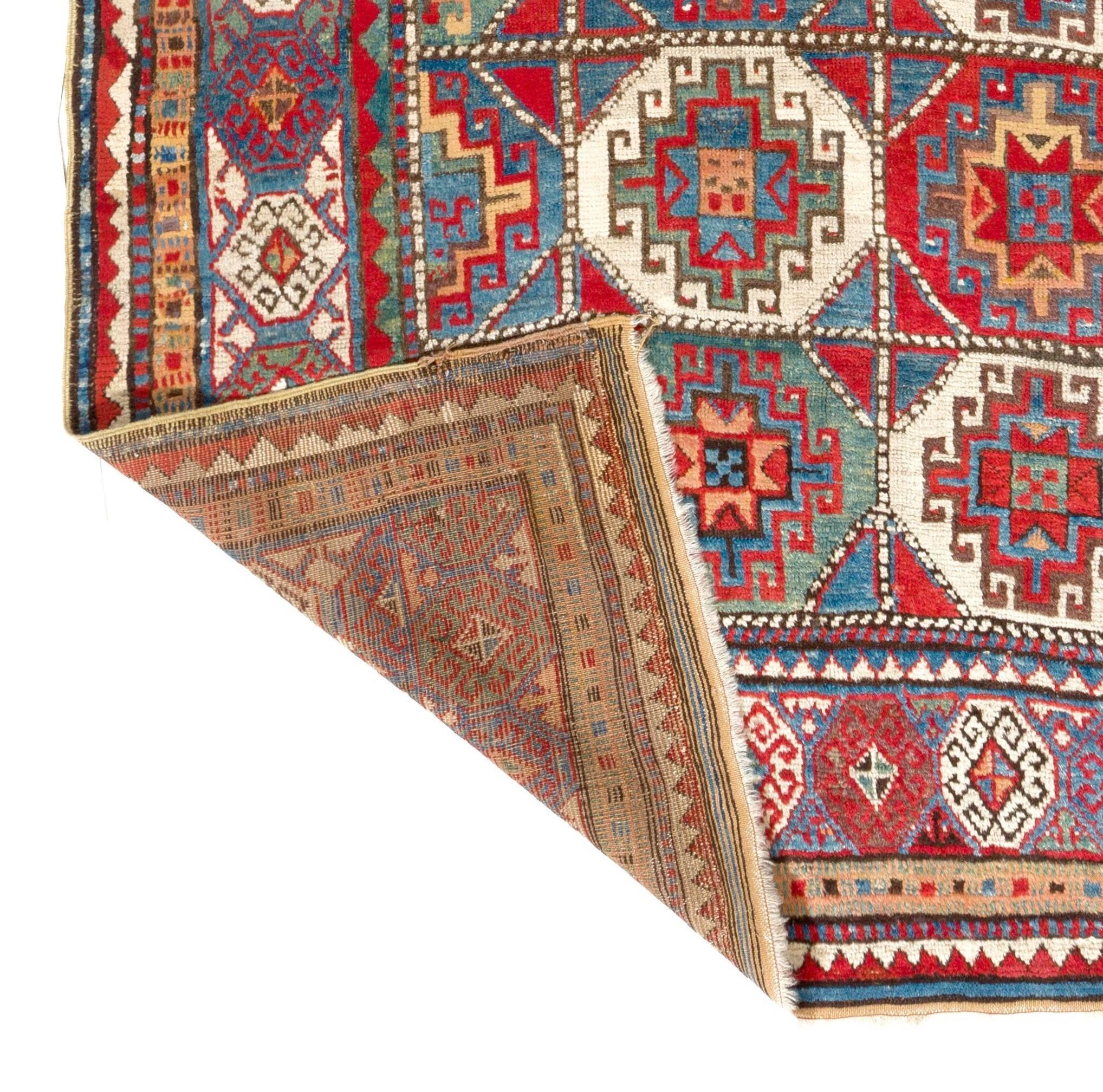 Azerbaijani Antique Moghan Kazak Wool Rug, Caucasus Mountains, circa 1870 For Sale
