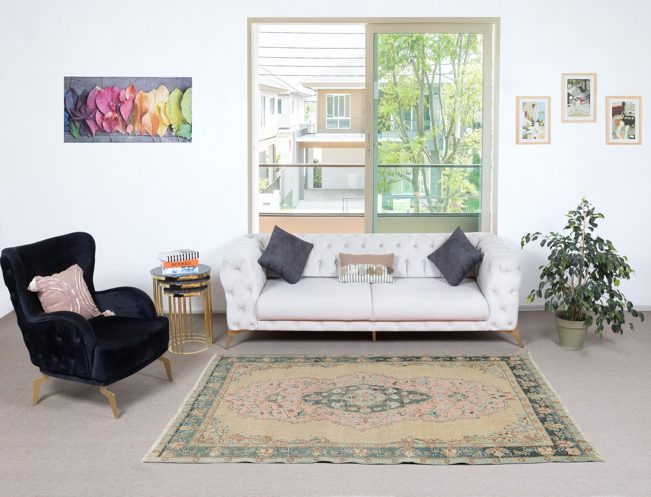 Infuse your home with the timeless beauty of this traditional vintage handmade Turkish rug, a hand-knotted masterpiece crafted from a luxurious blend of wool and cotton. Woven by skilled artisans using centuries-old techniques, this rug features