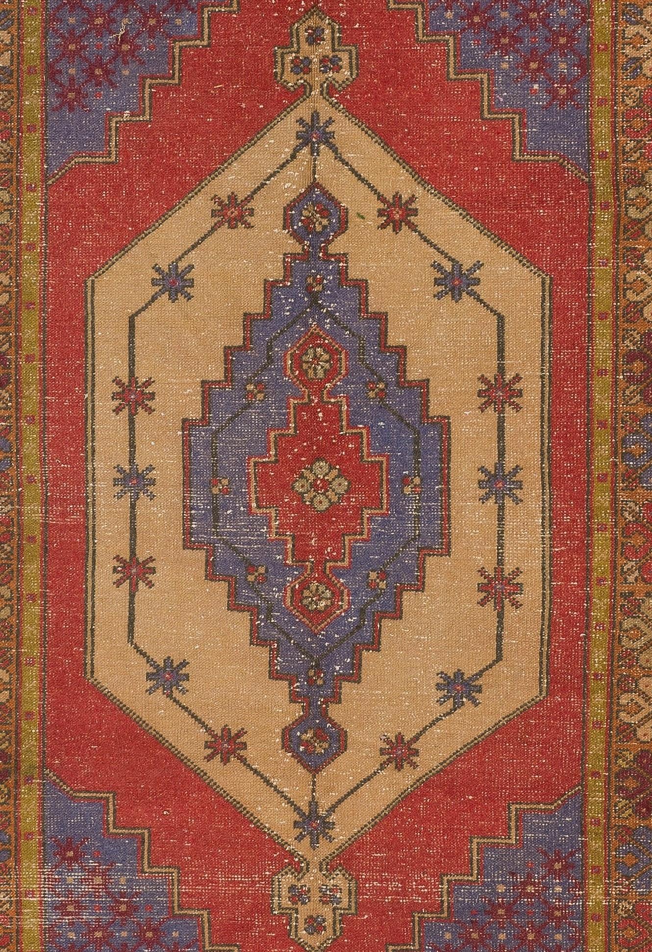 A vintage Central Anatolian village rug with pleasing colors and medium wool pile on a tightly woven wool foundation, very good condition. Measures: 4.8 x 9 Ft.

It has been washed professionally and ready to be used in a residential or commercial