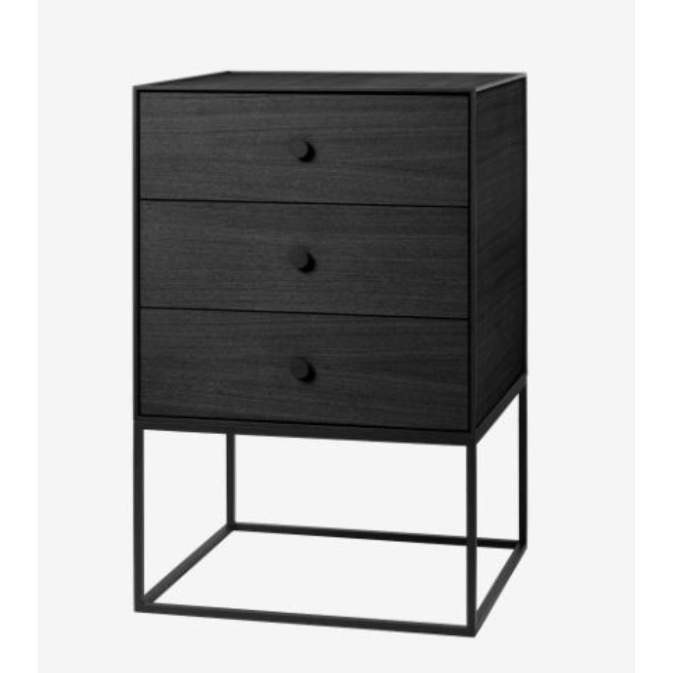 49 black ash frame sideboard with 3 drawers by Lassen
Dimensions: D 49 x W 42 x H 77 cm 
Materials: Finér, Melamin, Melamine, Metal, Veneer, ash
Also available in different colours and dimensions.
Weight: 21 Kg

By Lassen is a Danish design
