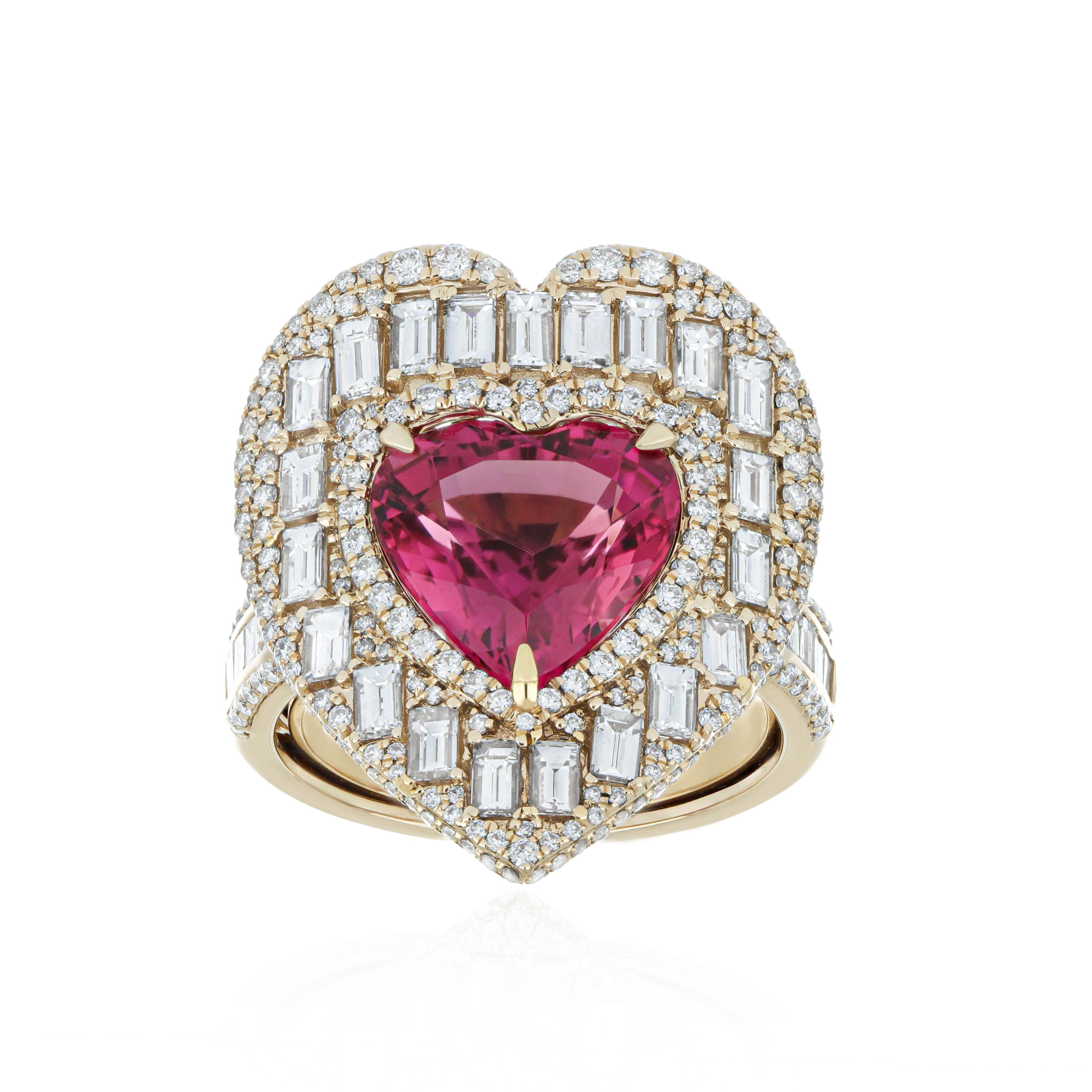 Elegant and exquisitely detailed 18K Yellow Gold Ring, with 4.9 Cts Heart Shape Rubellite set in center and Surrounded by Micro pave Diamonds, weighing approx. 3.35 CT's. total carat weight to further enhance the beauty of the ring. Beautifully Hand