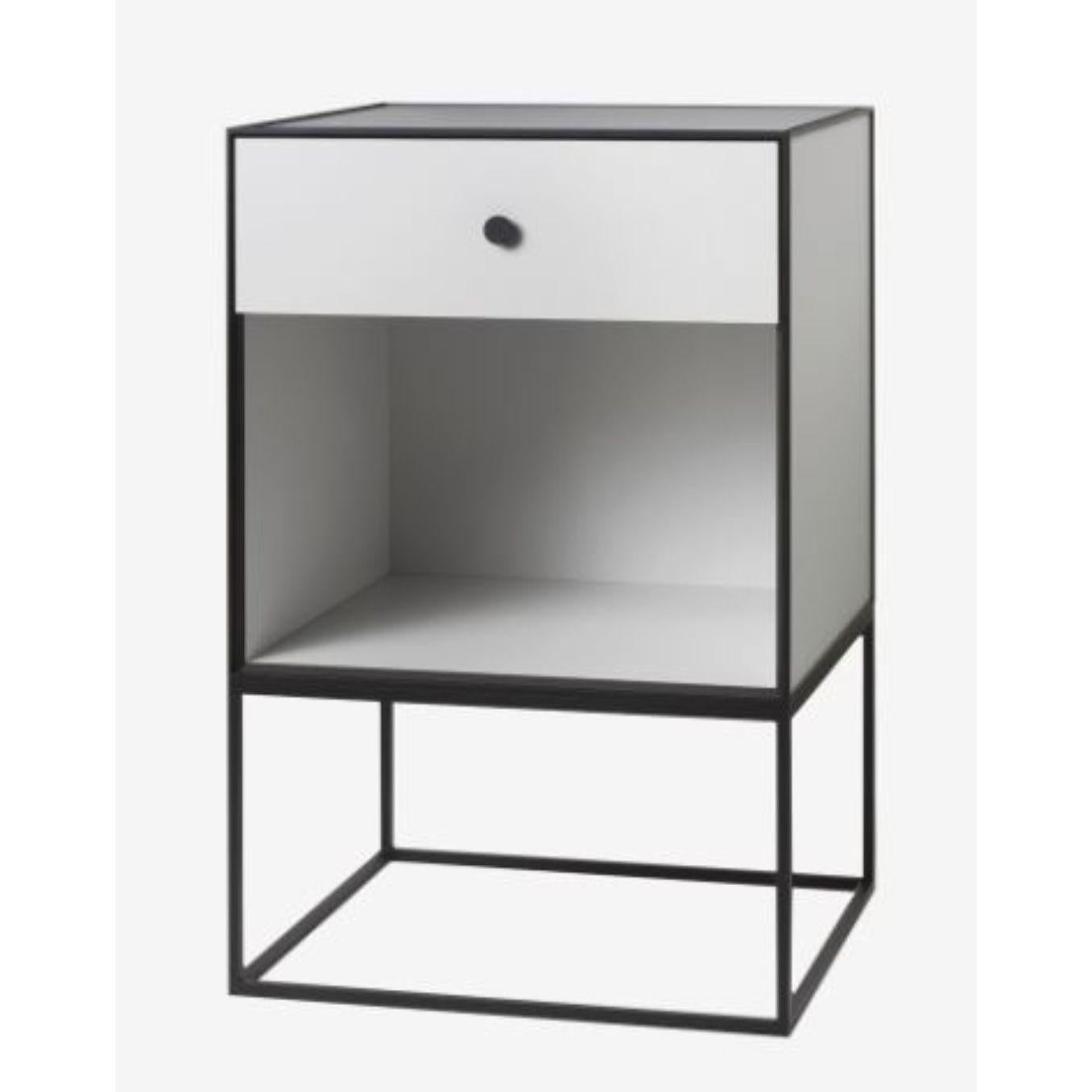 49 light grey frame sideboard with 1 drawer by Lassen
Dimensions: w 49 x d 42 x h 77 cm 
Materials: Finér, Melamin, Melamine, Metal, Veneer
Also available in different colors and dimensions.
Weight: 15.50 Kg

By Lassen is a Danish design brand