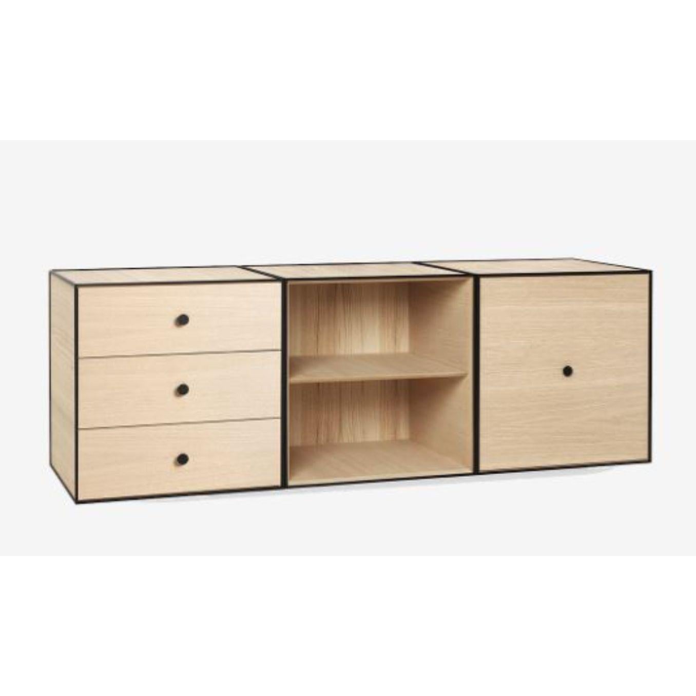 49 Oak frame box Trio by Lassen
Dimensions: D 147 x W 42 x H 49 cm 
Materials: finér, melamin, melamine, metal, veneer, oak
Also available in different colours and dimensions.
Weight: 45 Kg

By Lassen is a Danish design brand focused on iconic