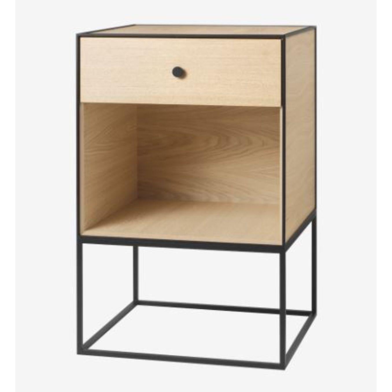 49 oak frame sideboard with 1 drawer by Lassen
Dimensions: W 49 x D 42 x H 77 cm 
Materials: Finér, Melamin, Melamine, Metal, Veneer, Oak
Also available in different colors and dimensions. 
Weight: 15.50 Kg

By Lassen is a Danish design brand