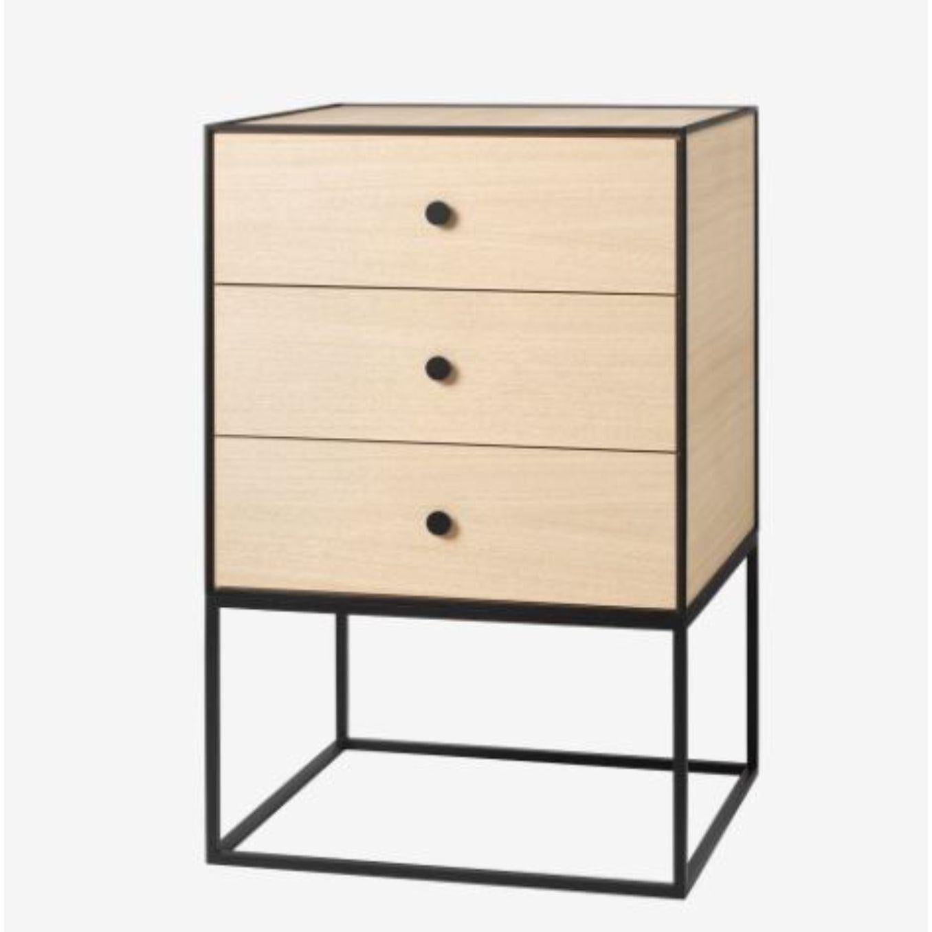 49 oak frame sideboard with 3 drawers by Lassen
Dimensions: D 49 x W 42 x H 77 cm 
Materials: Finér, Melamin, Melamine, Metal, Veneer, oak
Also available in different colors and dimensions.
Weight: 21 Kg

By Lassen is a Danish design brand