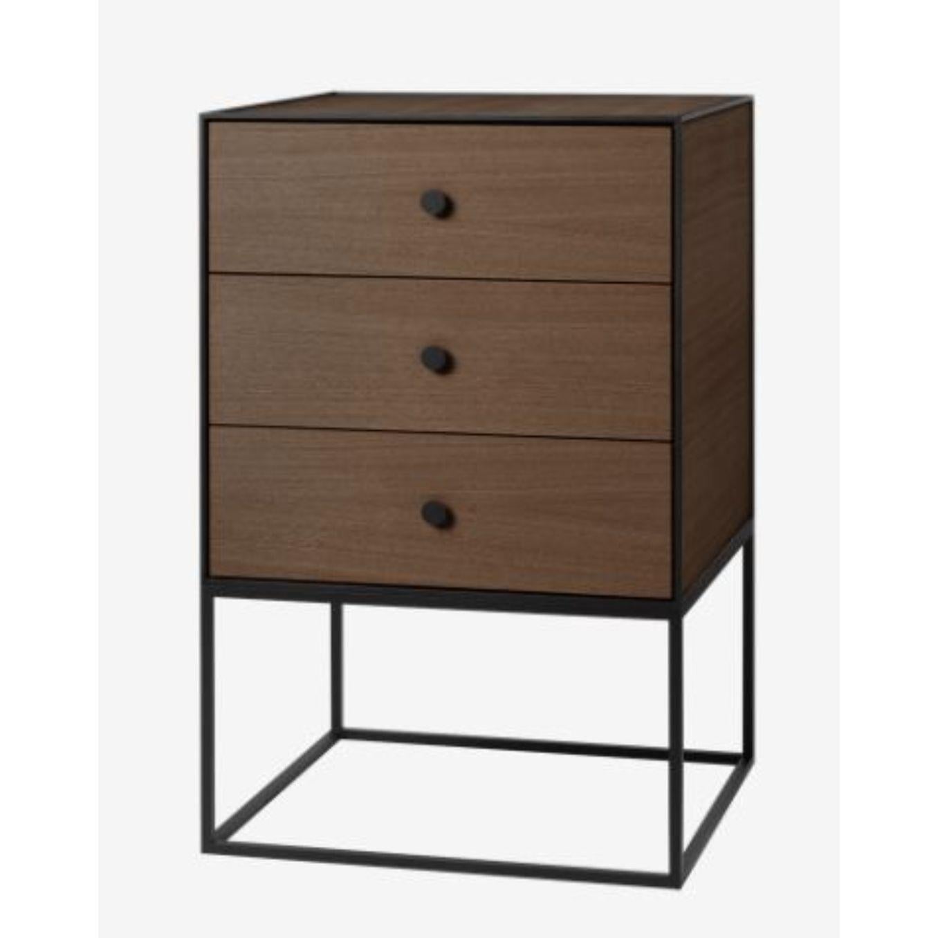 49 smoked oak frame sideboard with 3 drawers by Lassen
Dimensions: D 49 x W 42 x H 77 cm 
Materials: Finér, Melamin, Melamine, Metal, Veneer, Oak
Also available in different colors and dimensions. 
Weight: 21 Kg

By Lassen is a Danish design