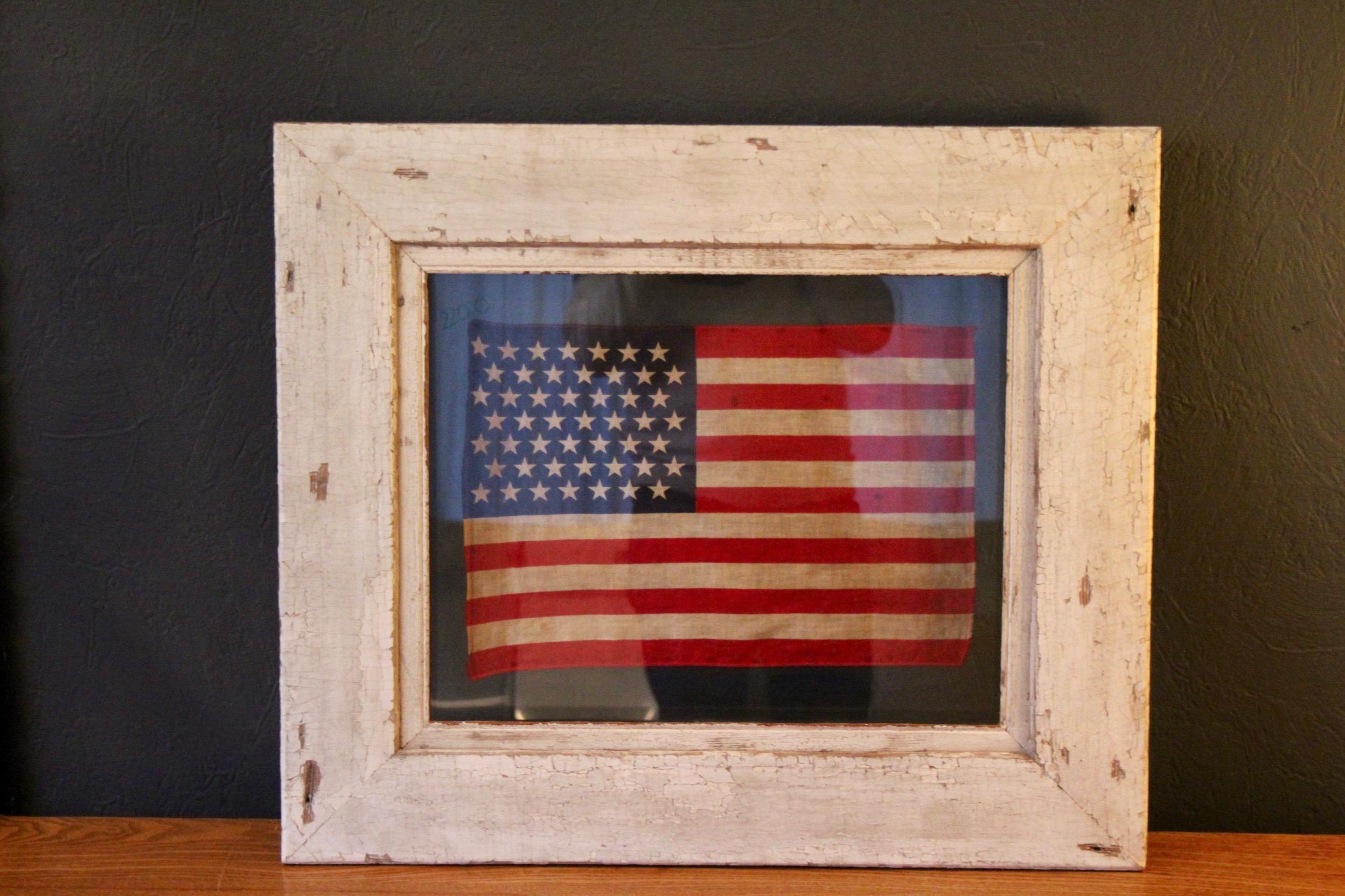 49-Star American Flag, Antique Printed on Silk, 20th Century , we can see on the back of the window that the flag was glued with a few dots of glue , the dimensions with the frame is H 61 by 70 cm 