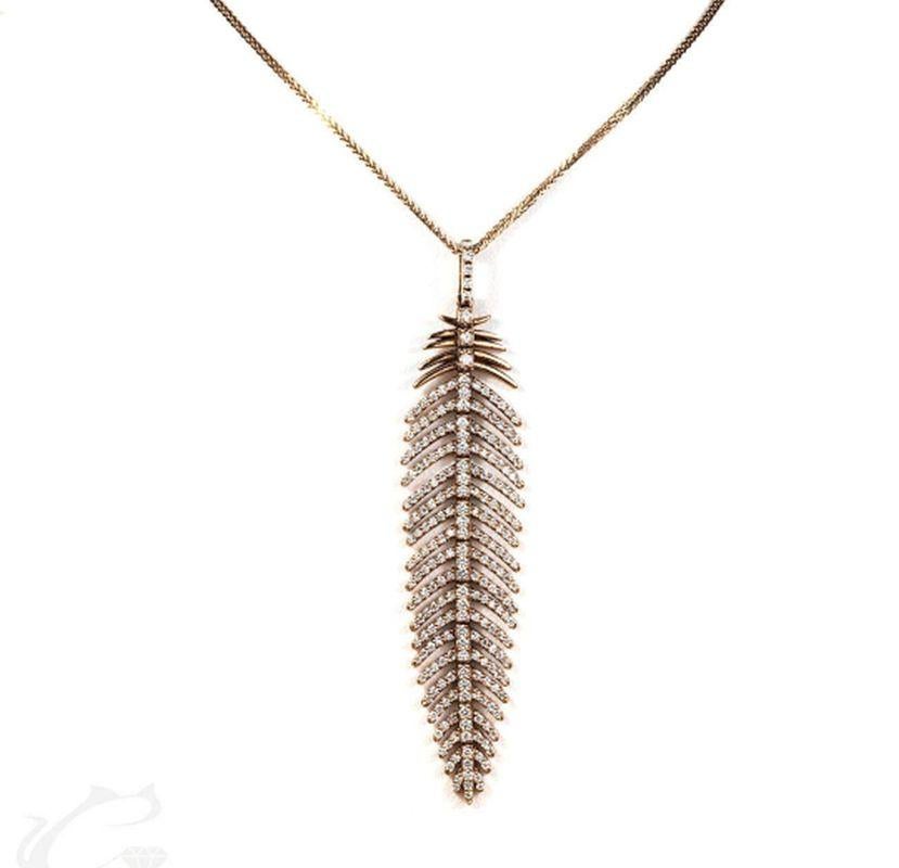 Classic Diamond Feather Earrings and Pendent set with 4.86 Carat Total Diamond Weight. 
Our handcrafted limited edition earrings and pendent will compliment everybody's wardrobe, they can complete a red carpet look and upgrade a casual look.
The