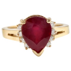 Impressionnante bague en or jaune 14 carats avec rubis rouge et diamants de 4,90 carats