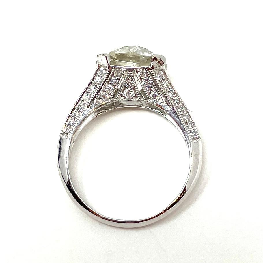 4.90 Carat Old European Cut Diamond in a Diamond and Platinum Ring For Sale 1