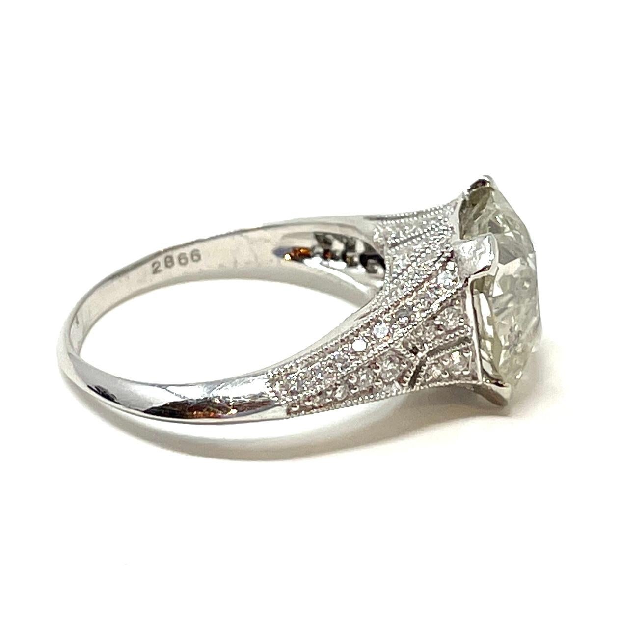 4.90 Carat Old European Cut Diamond in a Diamond and Platinum Ring For Sale 2