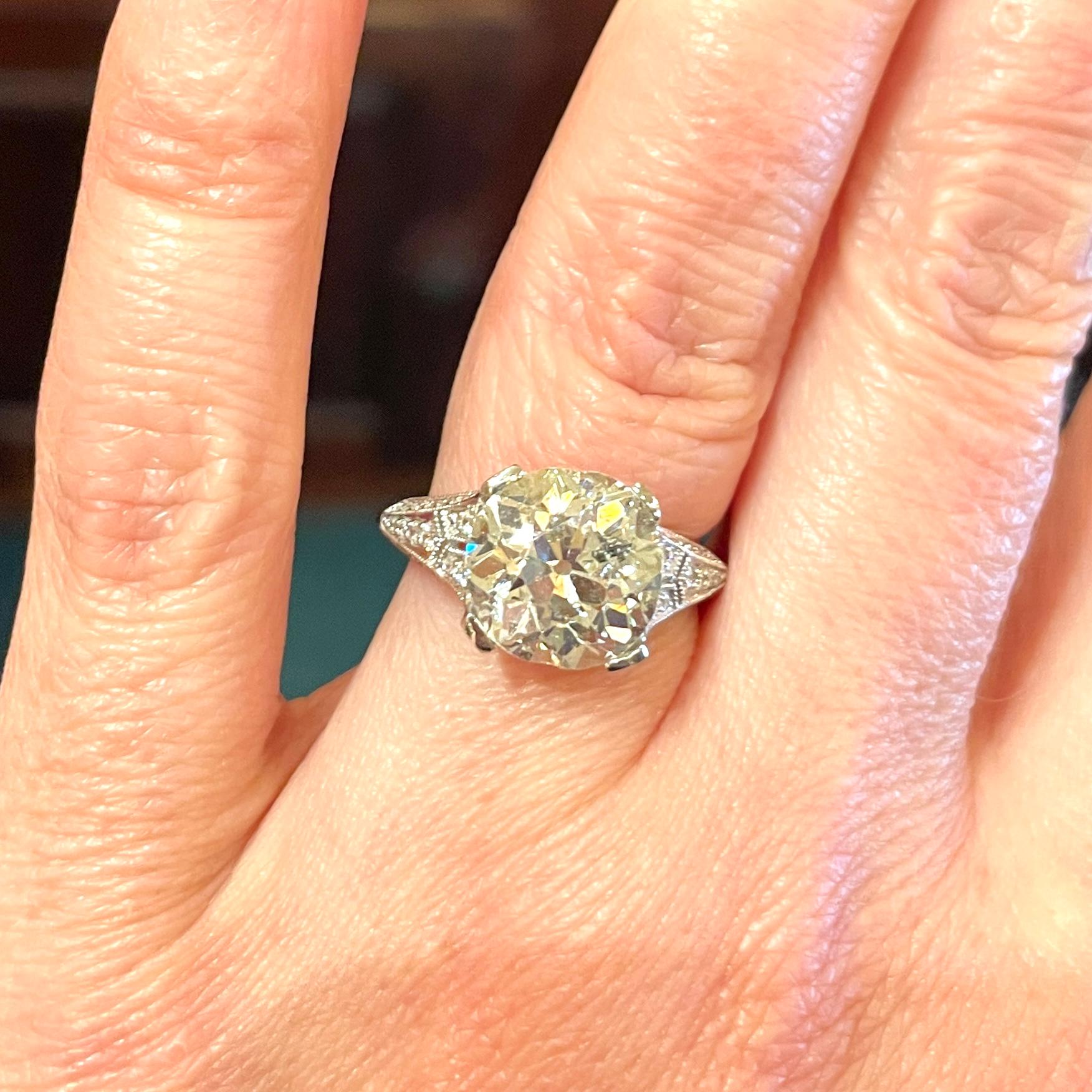 4.90 Carat Old European Cut Diamond in a Diamond and Platinum Ring For Sale 4