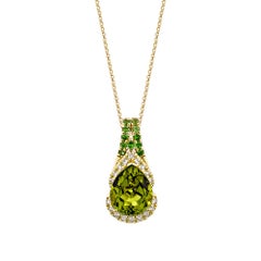 Sunita Nahata Peridot 4.90ct. Pendant in 18KYG with Tsavorite and Diamond.