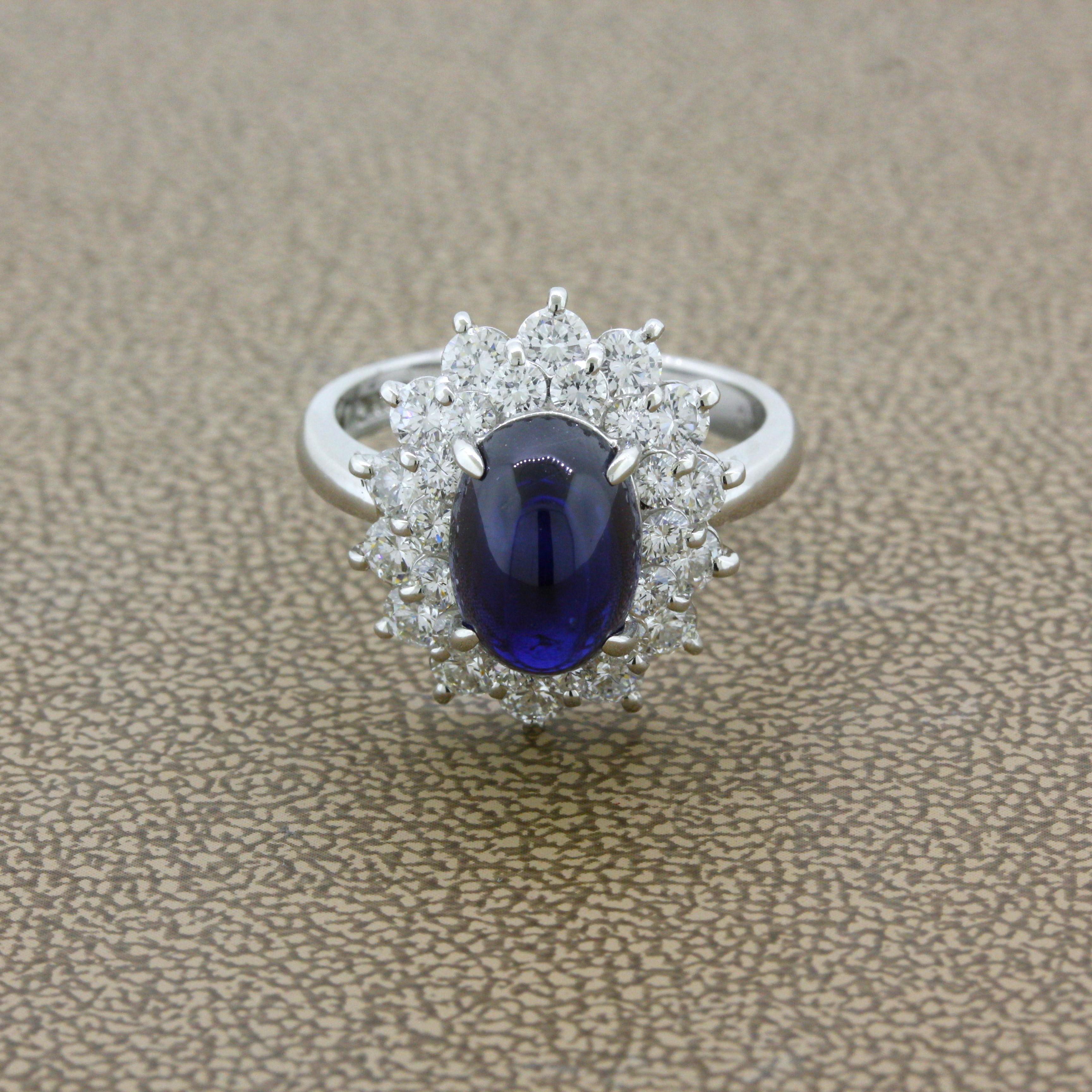 A chic and classy ring featuring a 4.90 carat sapphire with a rich vivid “royal” blue color that is so pleasing to the eye. It is complemented by 1.62 carats of bright white round brilliant-cut diamonds set around the sapphire in a Princess Diana