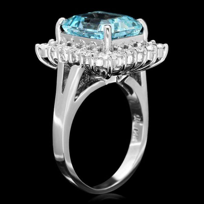 Anillo de oro blanco macizo de 14 quilates con aguamarina natural y diamantes de 4,90 quilates

Peso total de aguamarina natural: Aprox. 4.00 quilates 

Medidas de la aguamarina: Aprox. 11 x 10 mm

Diamantes Redondos Naturales Peso: Aprox. 0.90