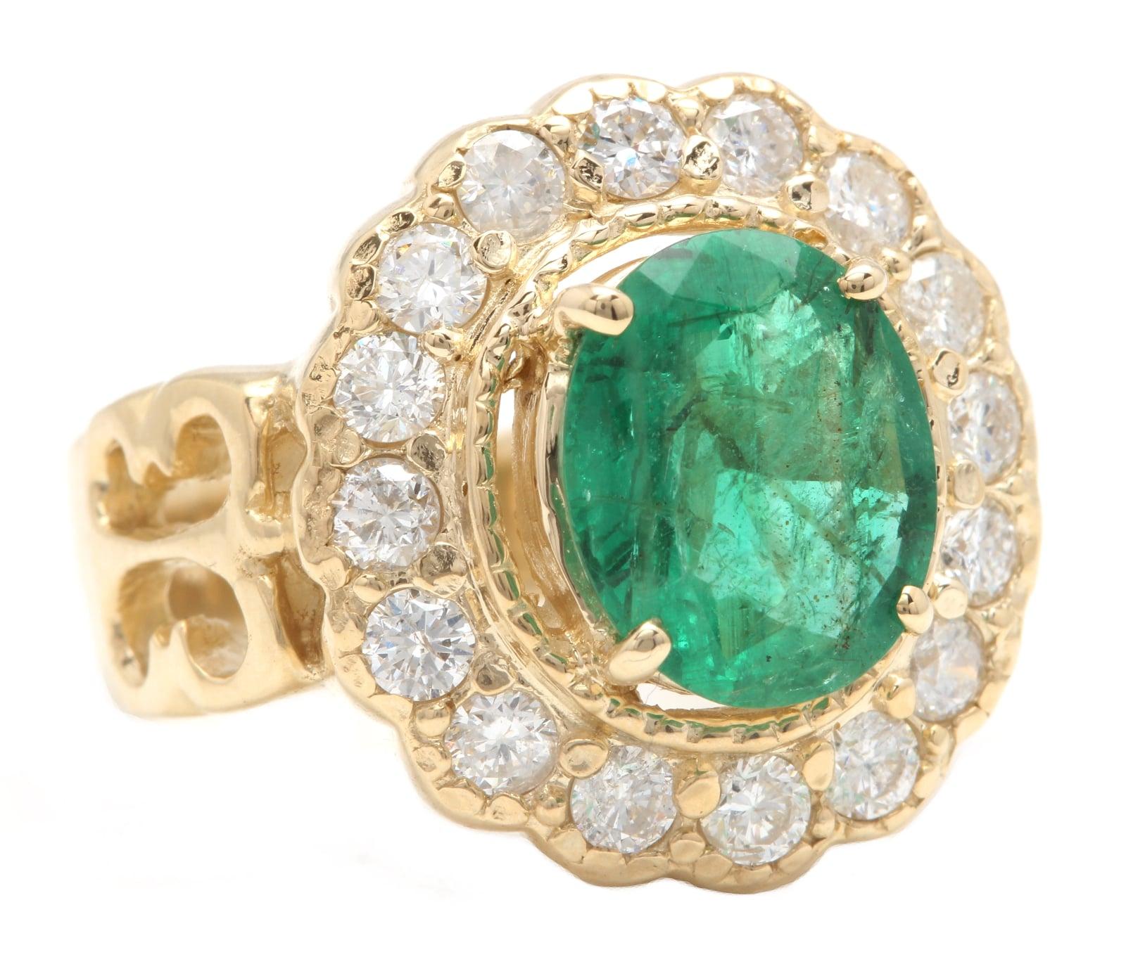 4.90 Carats Natural Emerald and Diamond 14K Solid Yellow Gold Ring

Suggested Replacement Value:  Approx. $8,000.00

Total Natural Cushion Cut Emerald Weight is: Approx. 3.50 Carats (Transparent)

Emerald Measures: Approx.  11.00 x 9.00mm

Emerald
