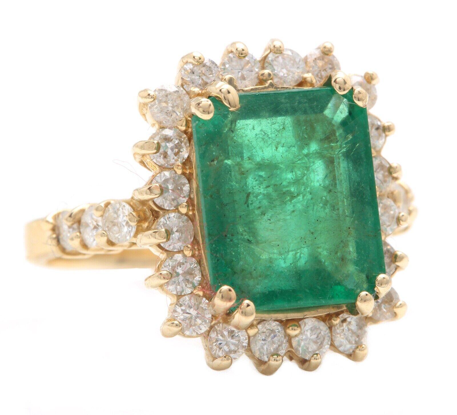 4.90 Carats Natural Emerald and Diamond 14K Solid Yellow Gold Ring

Suggested Replacement Value: $8,000.00

Total Natural Green Emerald Weight is: Approx. 4.00 Carats (transparent) 

Emerald Measures: Approx. 11.10 x 9.30mm

Natural Round Diamonds