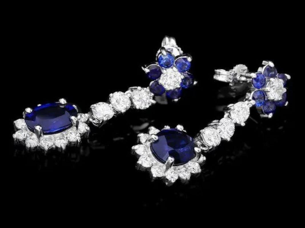 4.90 Carats Natural Sapphire and Diamond 14K Solid White Gold Earrings

Total Natural Sapphire Weight: Approx. 3.00 Carats

Sapphire Treatment: Diffusion

Sapphire Measure: Approx. 8 x 6 mm (2 Oval)

Sapphire Measure: Approx. 2.5 mm (12
