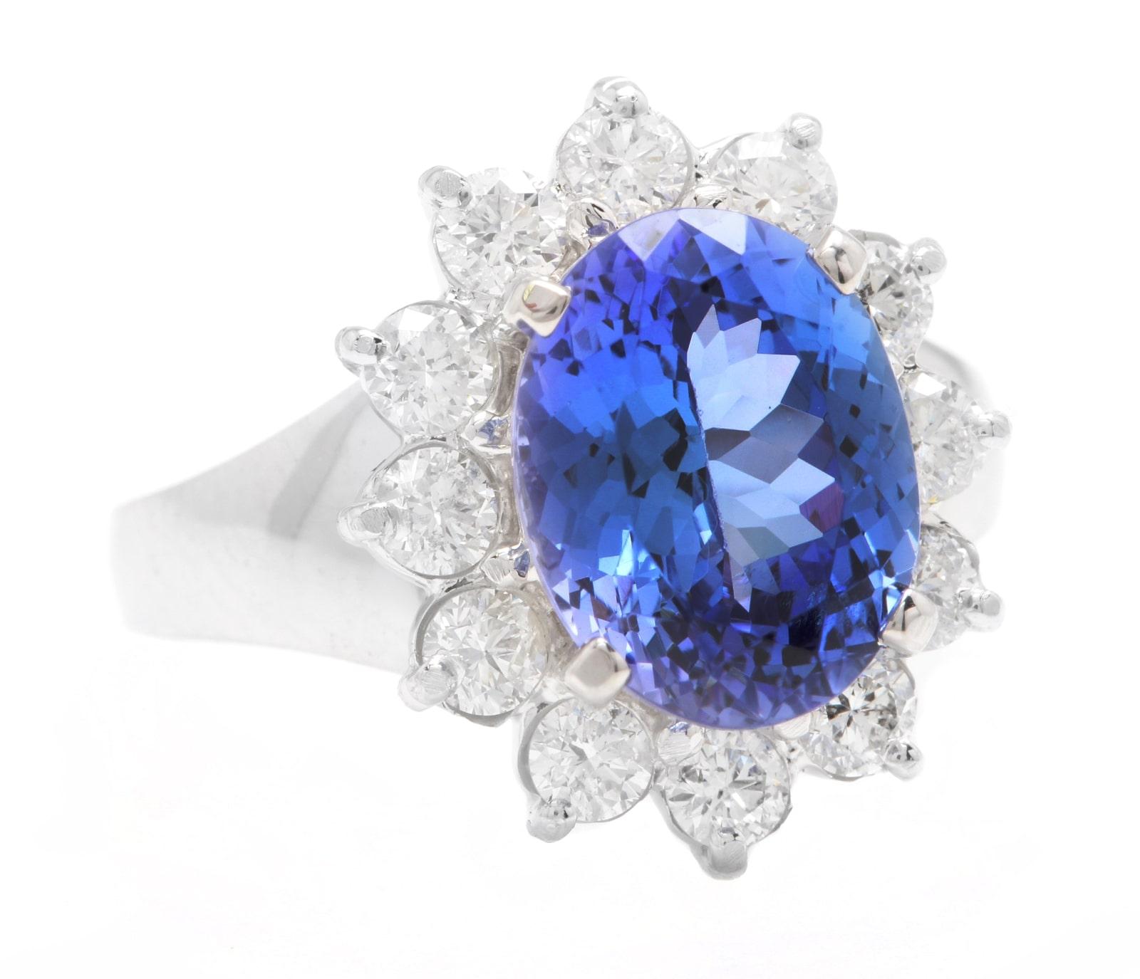 4.90 Carats Natural Very Nice Looking Tanzanite and Diamond 14K Solid White Gold Ring

Suggested Replacement Value: Approx.  $6,500.00

Total Natural Oval Cut Tanzanite Weight is: Approx. 4.00 Carats 

Tanzanite Measures: Approx. 11.00 x