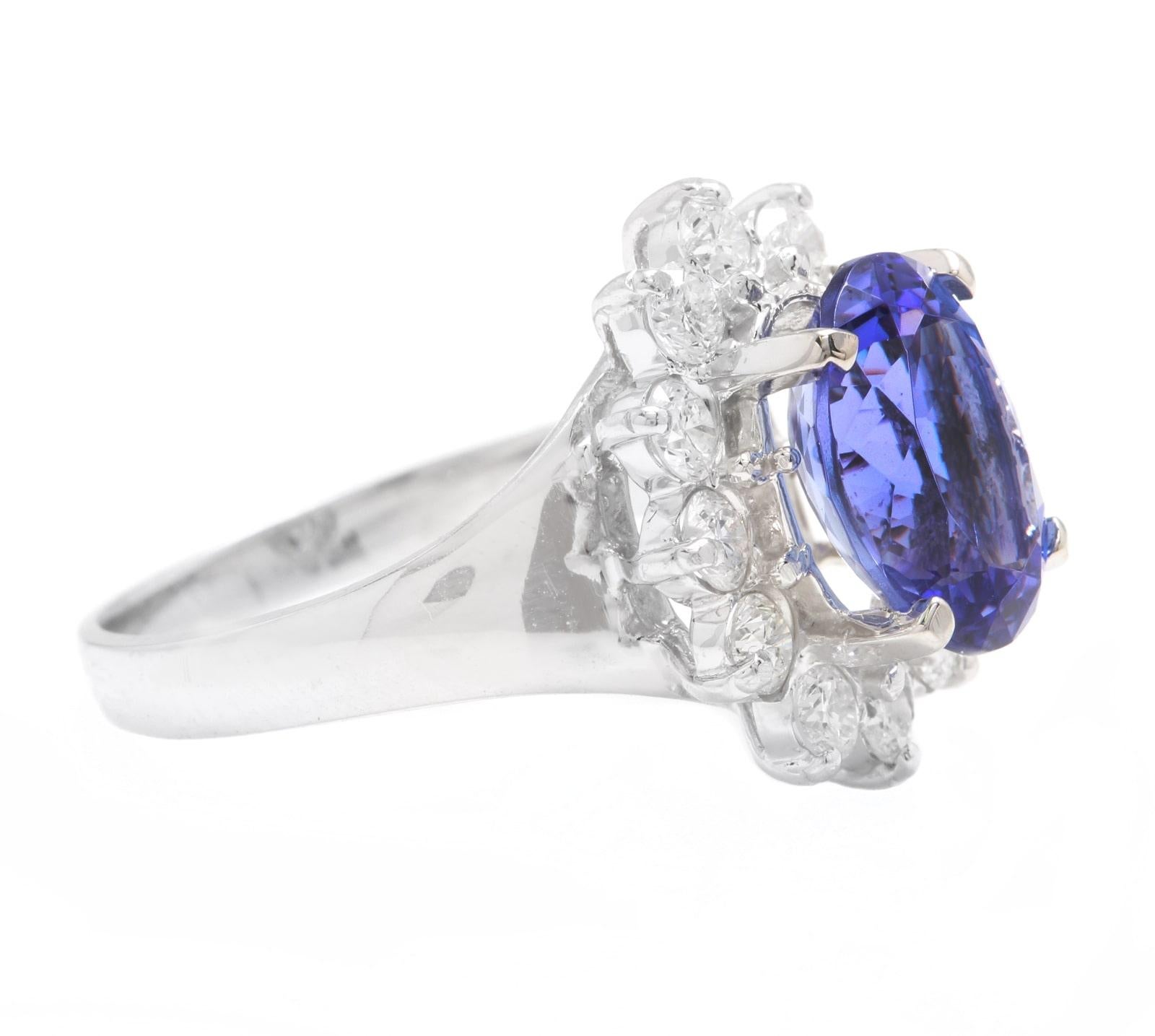 Oval Cut 4.90 Carat Natural Tanzanite and Diamond 14 Karat Solid White Gold Ring For Sale