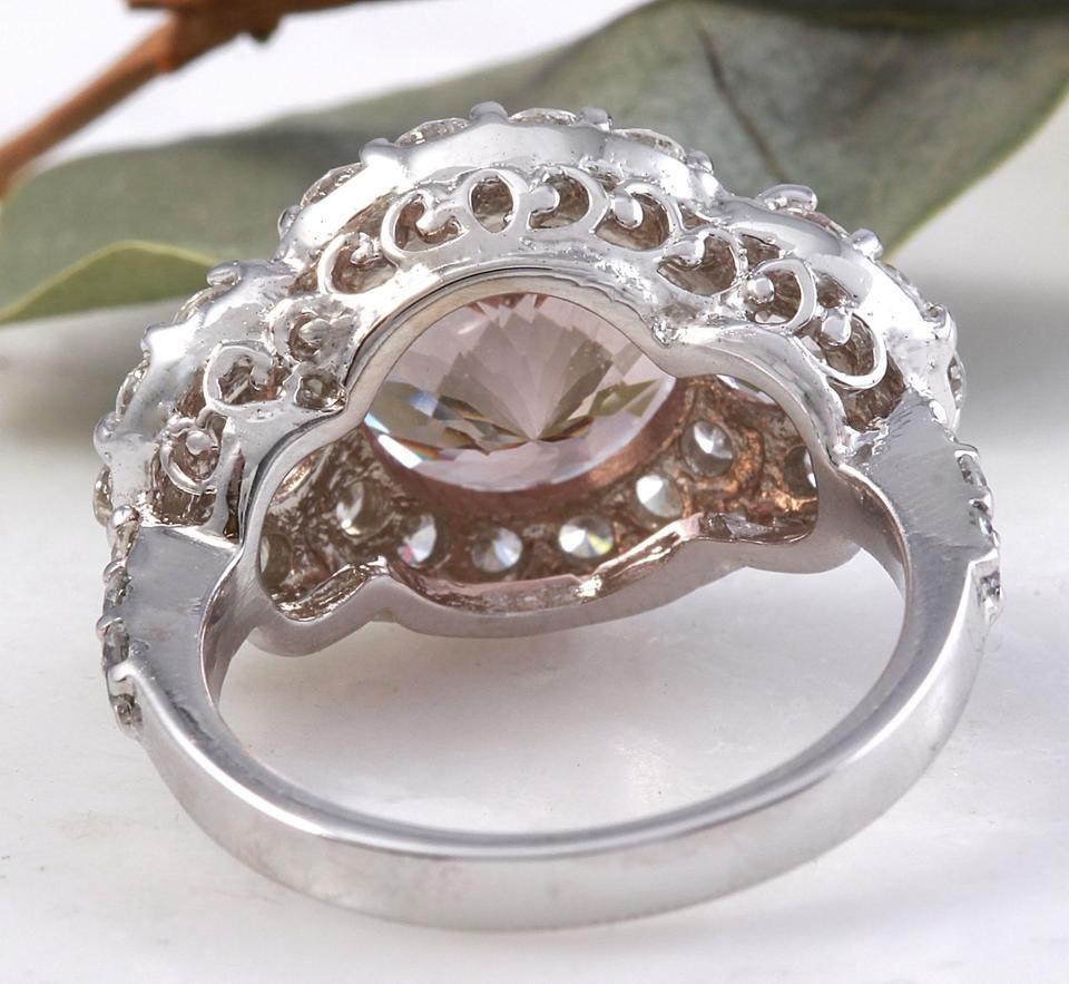 4.90 Carats Exquisite Natural Peach Morganite and Diamond 14K Solid White Gold Ring

Suggested Replacement Value: $6,900.00

Total Natural Morganite Weight: Approx. 3.70 Carats

Center Morganite Measures: 10mm

Natural Round Diamonds Weight: Approx.