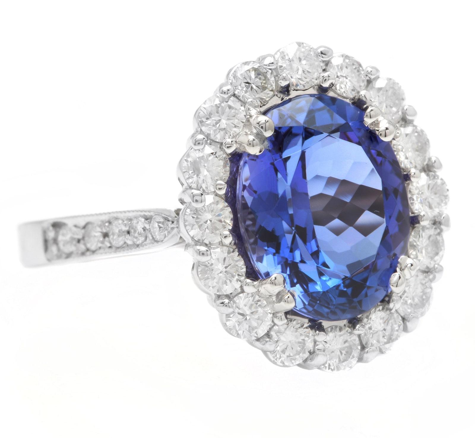 4.90 Carats Natural Very Nice Looking Tanzanite and Diamond 18K Solid White Gold Ring

Suggested Replacement Value: Approx.  $7,000.00

Total Natural Oval Cut Tanzanite Weight is: Approx. 4.00 Carats 

Tanzanite Measures: Approx. 11.50 x 9.50mm
