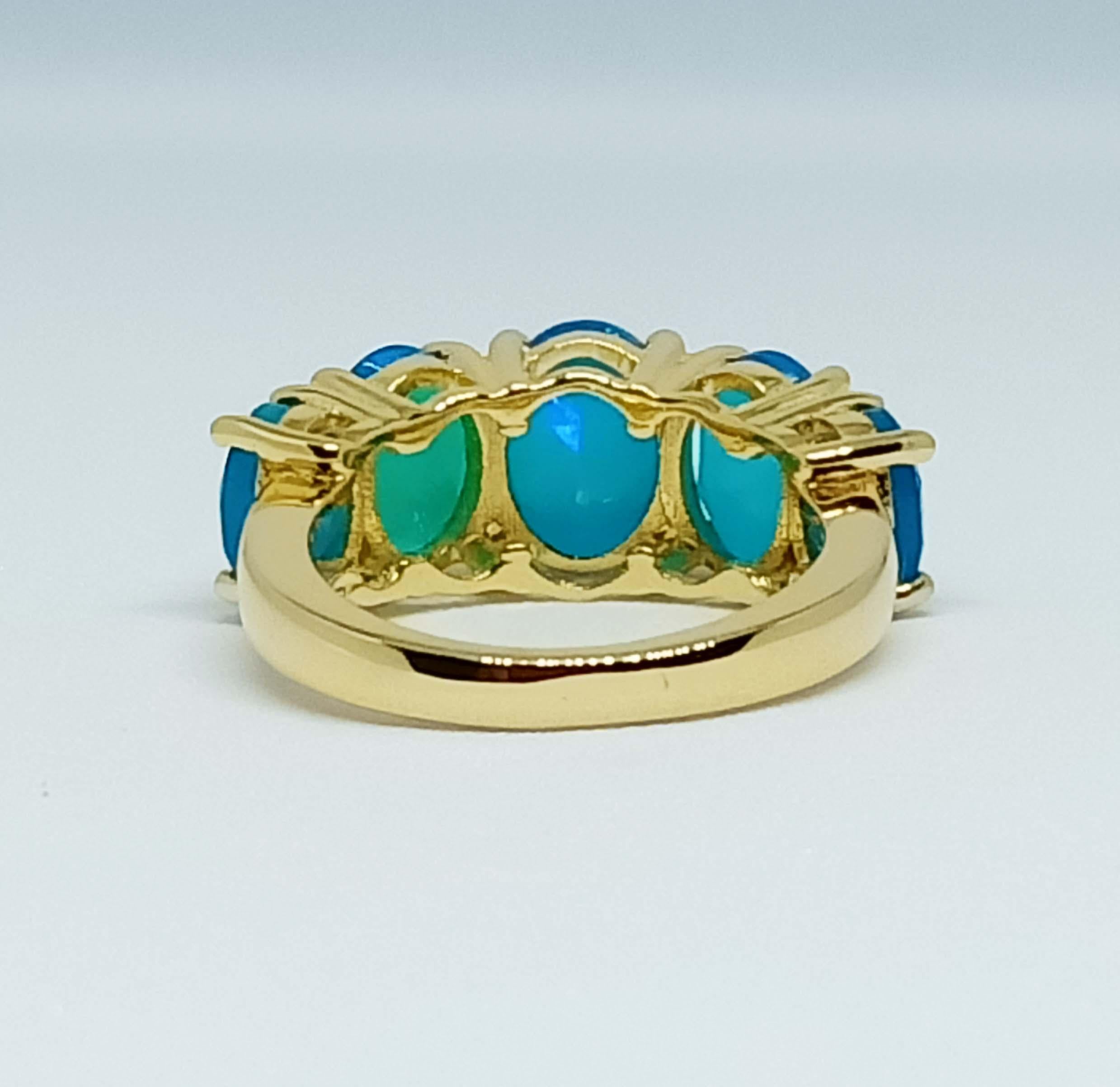 Oval Cut 4.90cts Blue opal ring. Sterling Silver in 18K Gold Plated. For Sale