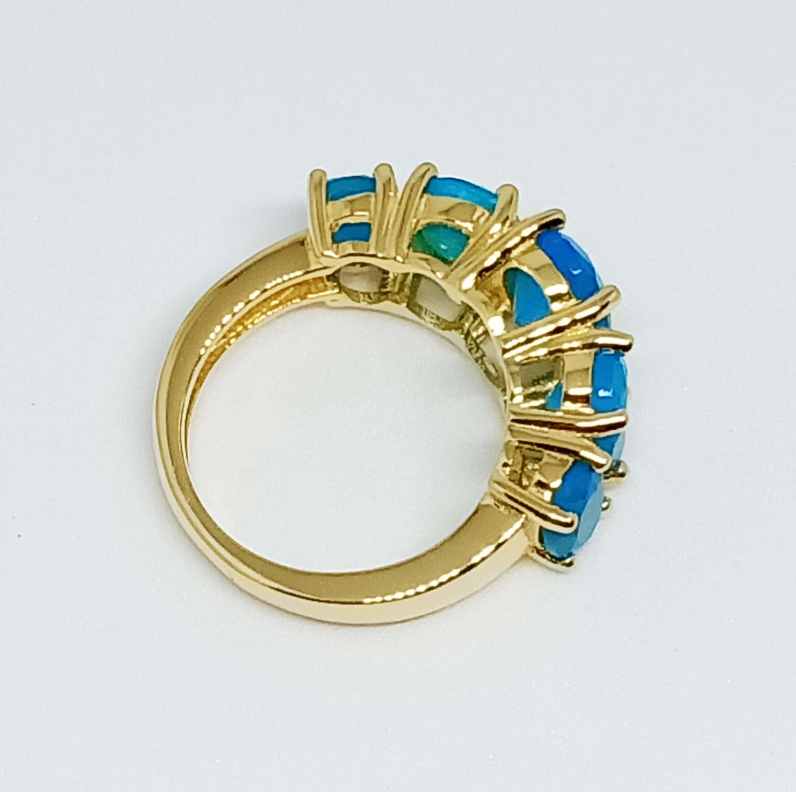 Women's 4.90cts Blue opal ring. Sterling Silver in 18K Gold Plated. For Sale