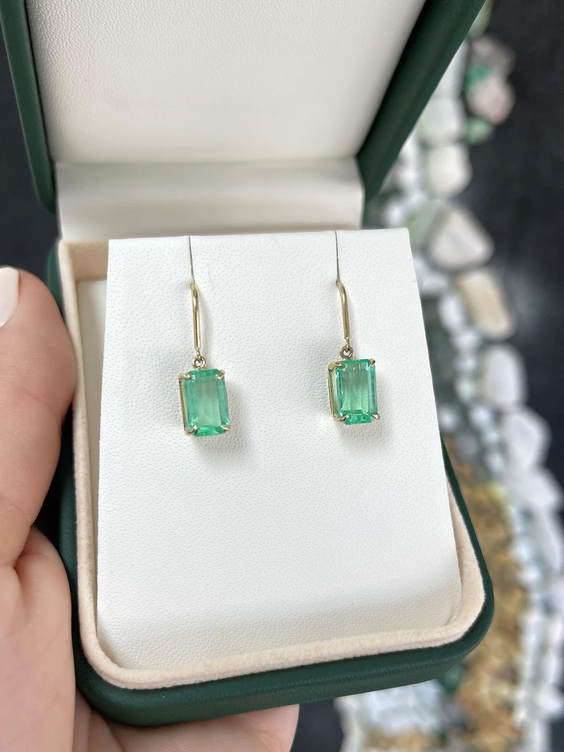 4.90tcw 14K Colombian Emerald Spring Green Emerald Cut Gold Dangle Earrings In New Condition For Sale In Jupiter, FL