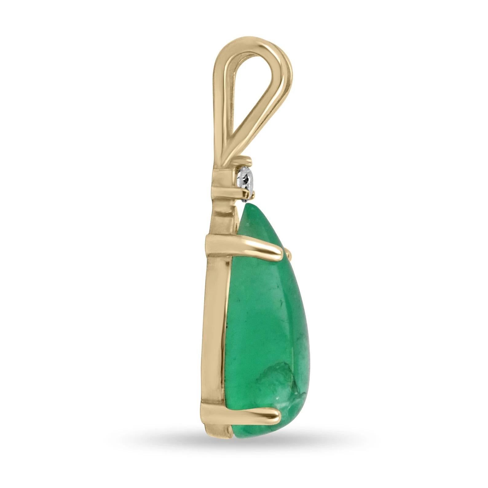 A Colombian emerald, pear cabochon, and diamond accent pendant. The natural, Colombian emerald carries a full 4.85-carats, medium green color. The stone displays good luster and eye clarity with natural imperfections to the eye. Accented at the top,