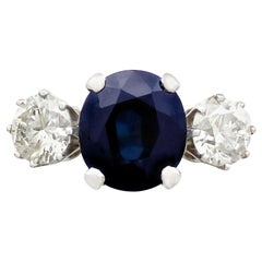 4.91 Carat Blue Sapphire 1.34 Carat Diamond Gold Trilogy Ring