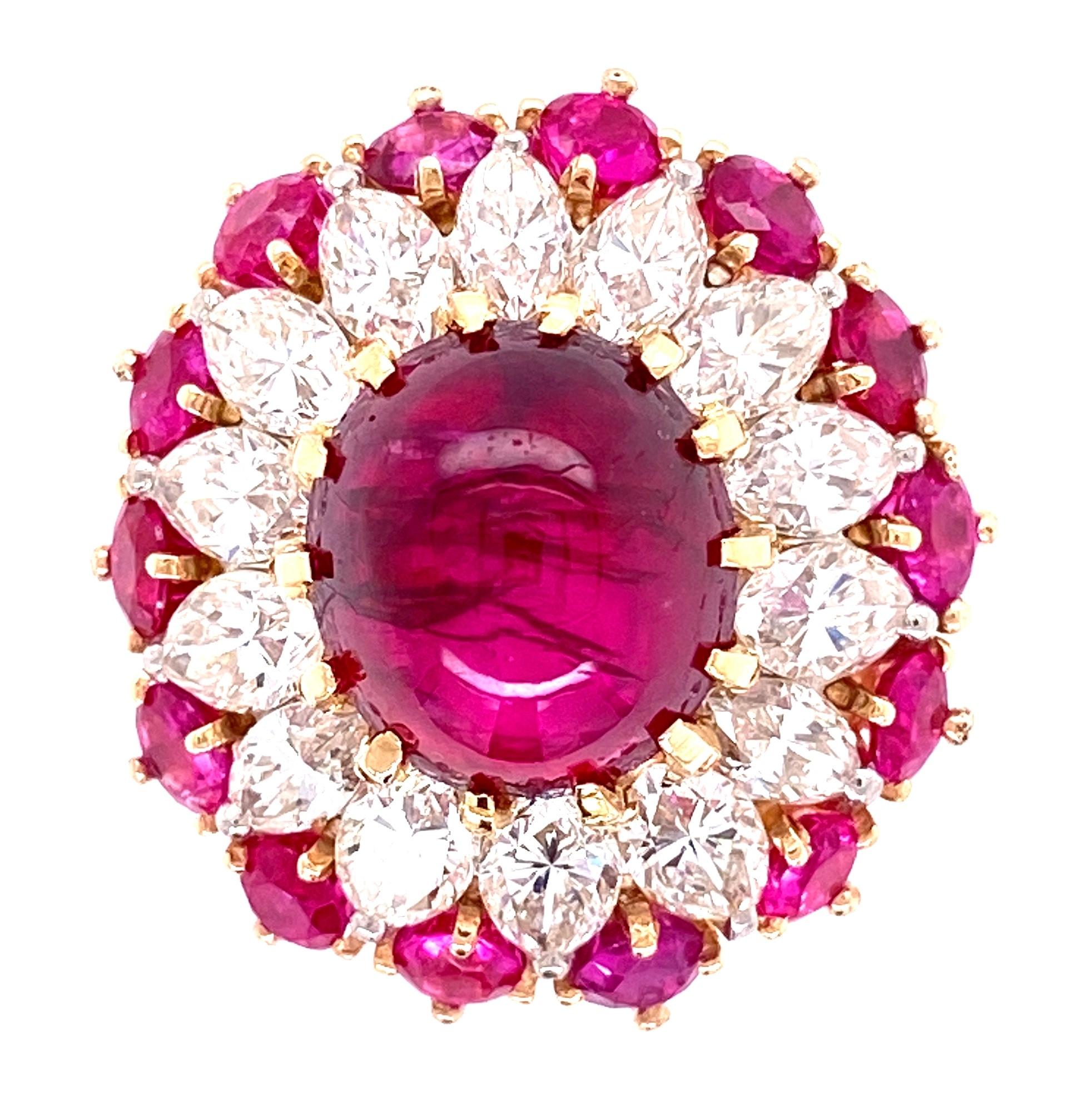 Simply Fabulous! Ruby and Diamond Platinum and Gold Bombay design Cocktail Ring. Centering a securely nestled Hand set GIA Natural Untreated No Heat Ruby weighing 4.91 Carat. The center stone has been removed and replaced to get the exact weight of