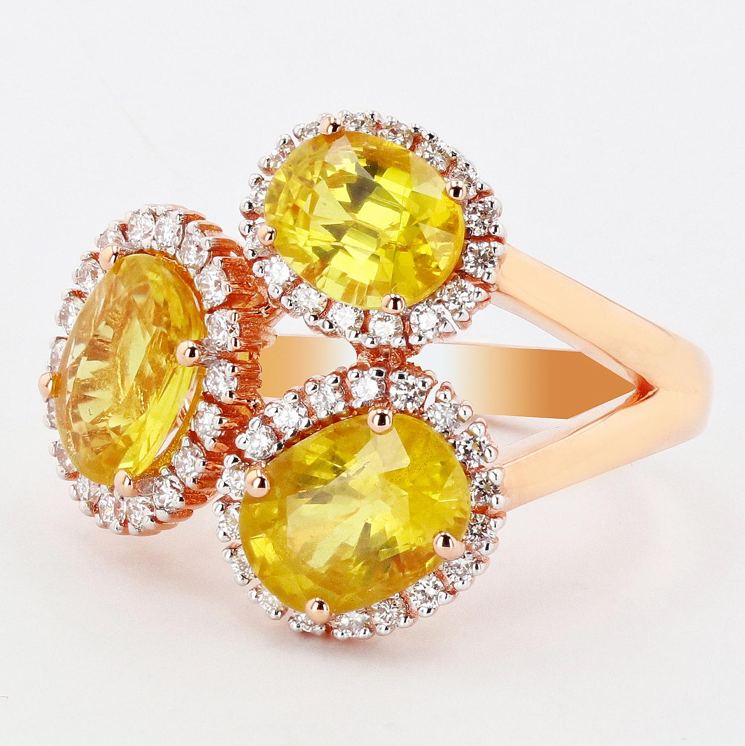 One electronically tested 18KT rose gold cast yellow sapphire & diamond ring. 

Each of the featured sapphires are set within a diamond bezel, supported by a ribbed under gallery, completed by a two millimeter wide band. Bright polish finish.