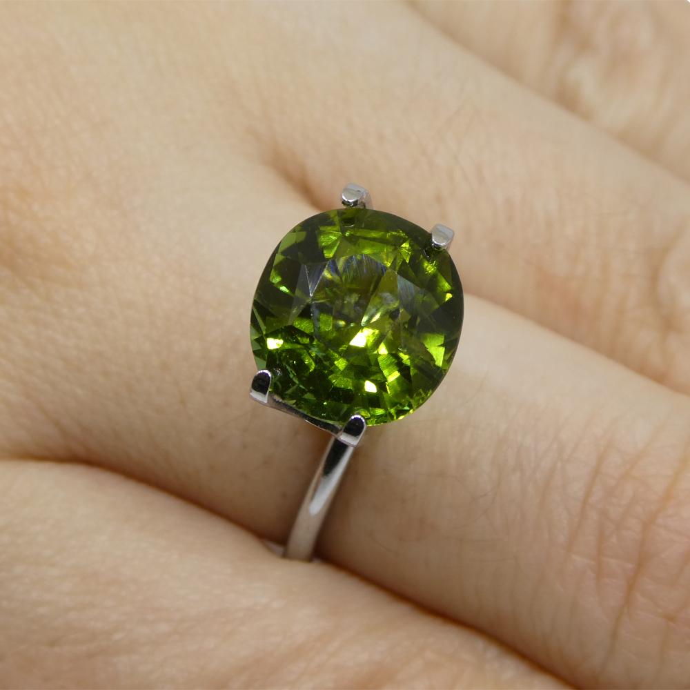 Description:

Gem Type: Tourmaline
Number of Stones: 1
Weight: 4.92 cts
Measurements: 10.66 x 10.03 x 7.20 mm
Shape: Cushion
Cutting Style Crown: Modified Brilliant Cut
Cutting Style Pavilion: Brilliant
Transparency: Transparent
Clarity: Very
