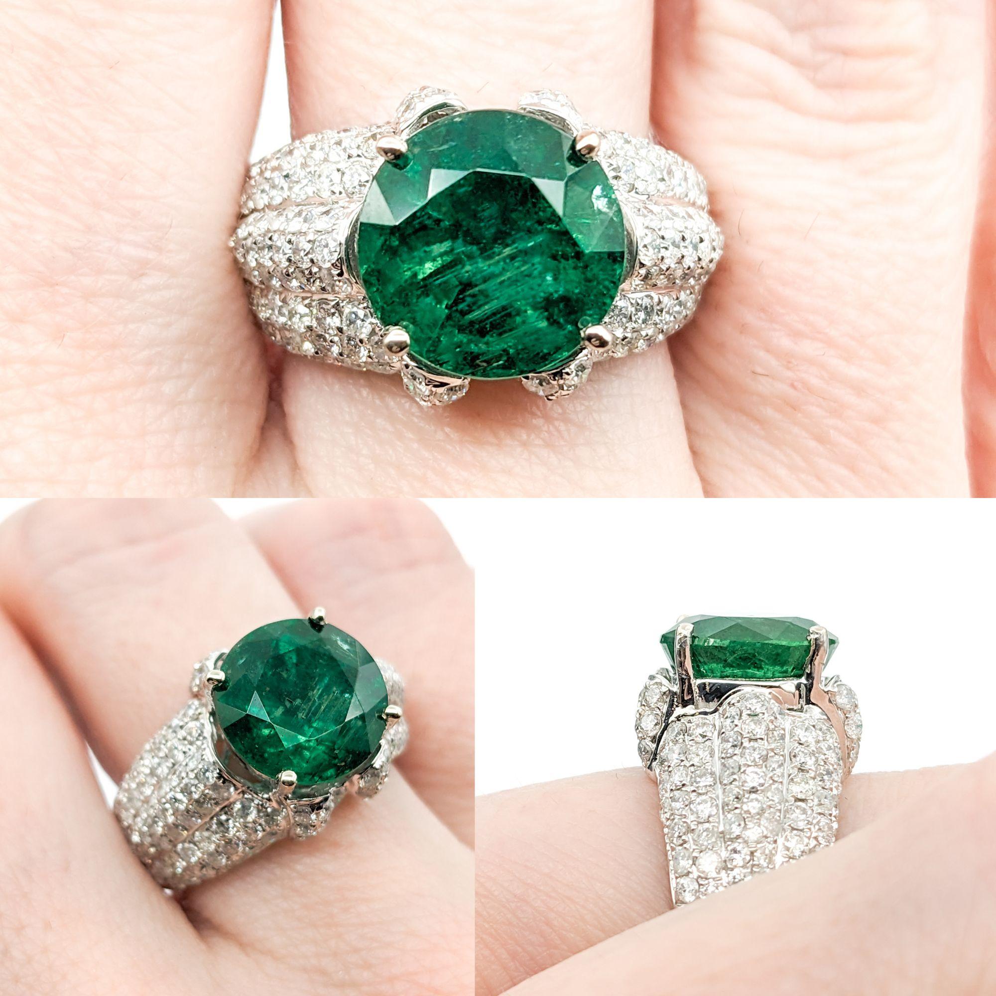 4.92ct Emerald & Diamond Ring In White Gold

Introducing this exquisite 4.92ct Emerald Statement Ring crafted in 14K White Gold, a stunning blend of luxury and elegance. The vibrant green hue and regal presence of the emerald make it the focal point