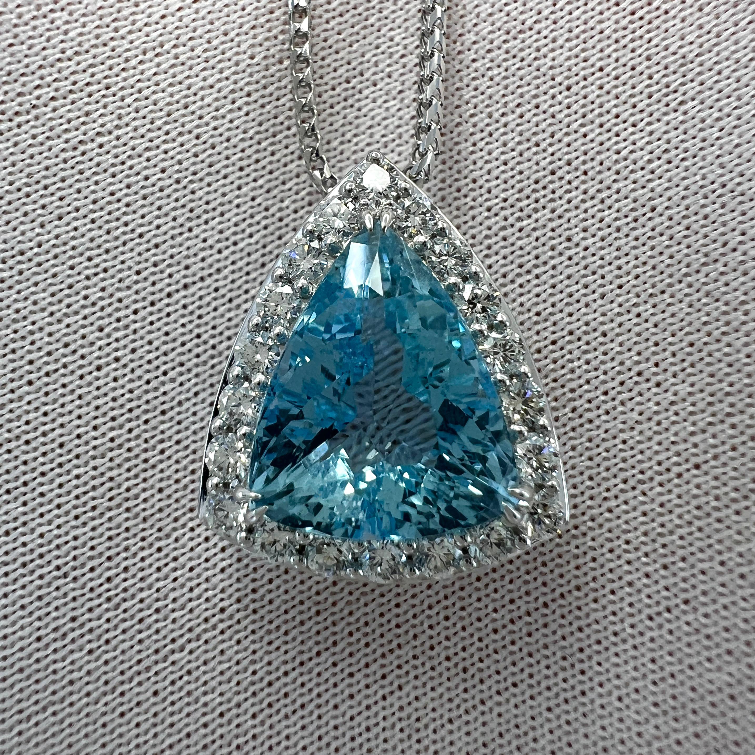 Natural Fine Blue Fancy Triangle Cut Santa Maria Aquamarine & Diamond 18k White Gold Halo Pendant Necklace. 4.92ct total.

4.37 Carat aquamarine with a fine Santa Maria blue colour and very good clarity, very clean stone with only some small natural