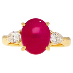 4.93 Carat Cabochon Cut Ruby & Oval Cut Diamond Three Stone 18K Ring