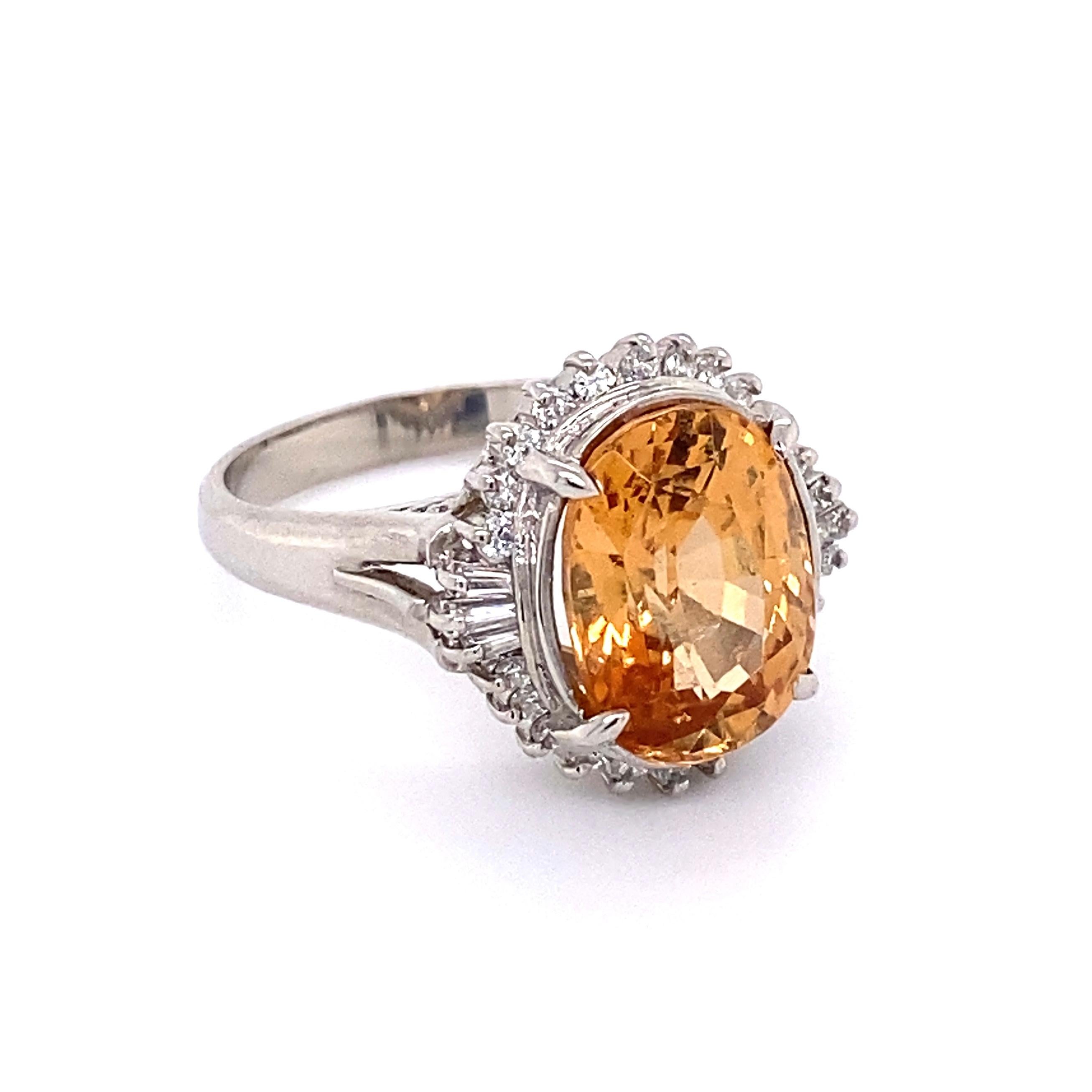 Simply Beautiful! Finely detailed Imperial and Diamond Platinum Cocktail Ring, center securely nestled with an Oval Imperial Topaz, approx. 4.93 Carat, surrounded by Diamonds, approx. 0.32tcw. Hand crafted Platinum mounting. Ring size 6.5, we offer