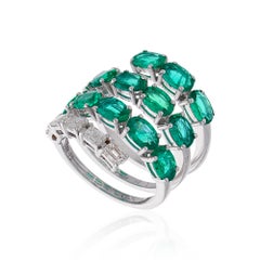 4.93 Carat Oval Zambian Emerald Spiral Ring 0.76 Ct Diamond 18 Karat White Gold