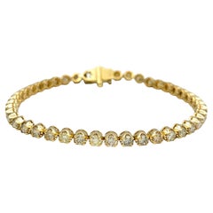 Tennisarmband aus 18 Karat Gelbgold mit 4,93 Karat rundem Diamanten im Brillantschliff